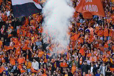 Orange-clad fans
